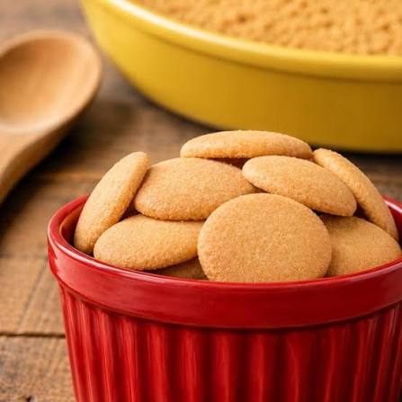 Vanilla wafers piled in a red bowl