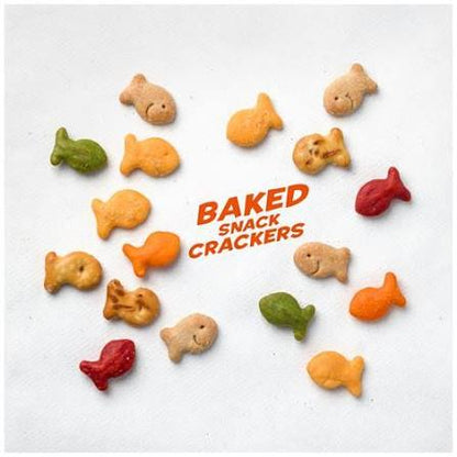 Assorted Goldfish crackers scattered on white background