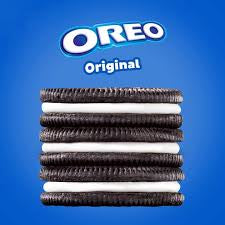 Oreo cookies stacked against blue background
